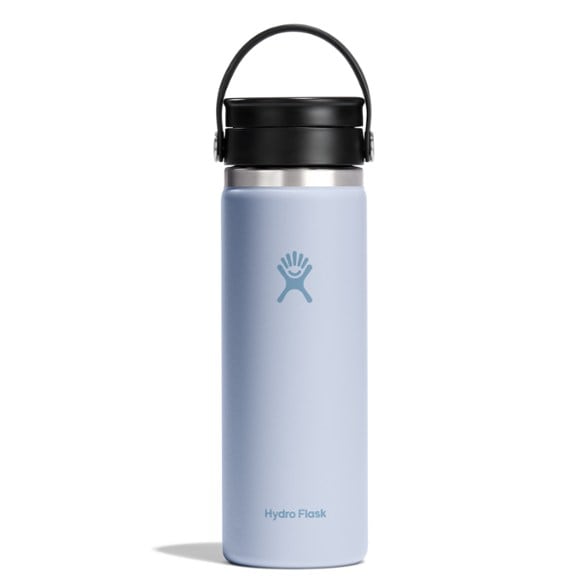 Side view of Hydro Flask travel coffee mug with leakproof Flex Sip lid in outdoor setting