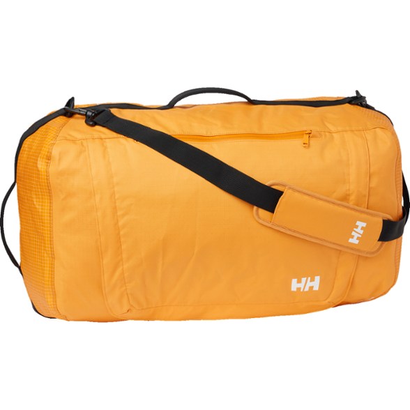 Helly Hansen waterproof duffel bag packed with outdoor gear, showing U-shaped opening
