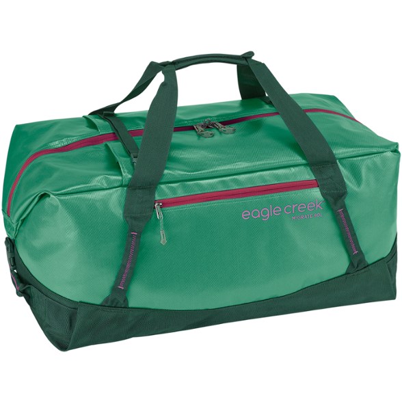 Eagle Creek Migrate 90L duffel bag in use, showcasing its durability and water-resistance