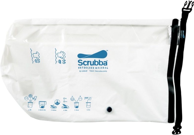 Scrubba wash bag with water and clothes, demonstrating easy portable laundry setup.