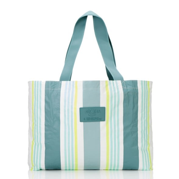Large waterproof tote bag with beach and travel versatility