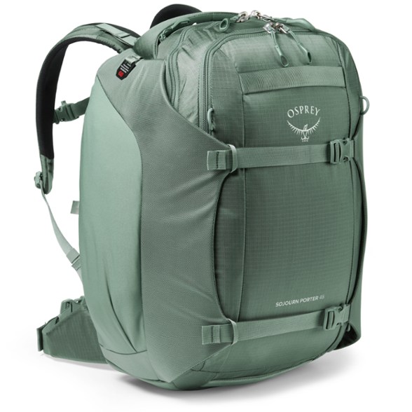 Front view of the Osprey Sojourn Porter 46L showing sleek compression straps and laptop compartment