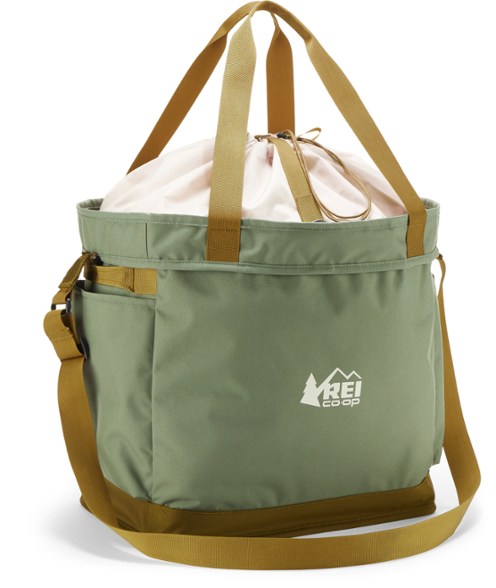 EcoTrail 45 Travel Tote placed snugly in a vehicle's footwell, ideal for organizing outdoor gear.