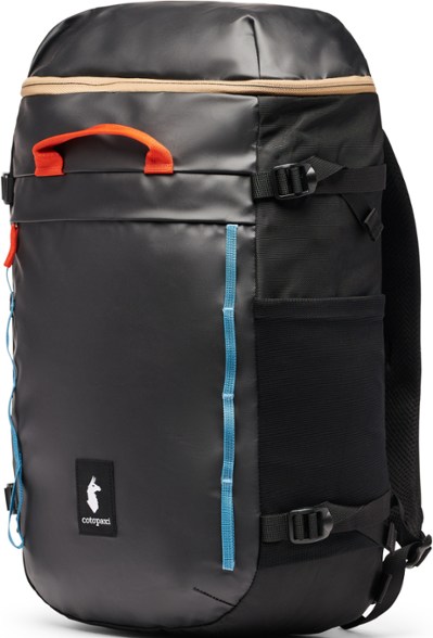 Torre 24L backpack worn by traveler in airport setting, showing ergonomic shoulder straps