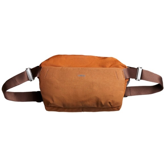 TrailFlex 9L SlingPro shown from side angle worn crossbody, perfect travel bag for commuters.