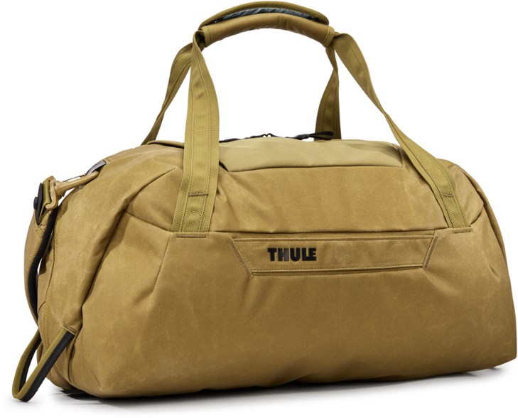 Angled side view of Voyage35 duffel bag showing waxed canvas material and front zipper pocket