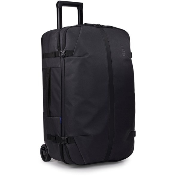 Voyager Pro 28 inch wheeled duffel, displayed at an angle, showing its sleek waxed canvas and heavy-duty wheels, ideal for any travel duffel bag adventure.