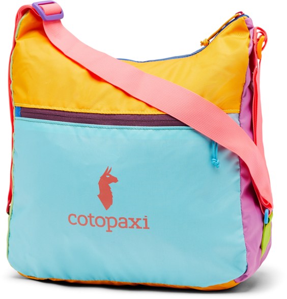 Cotopaxi Taal Del Dia Convertible Tote Bag in use as a shoulder strap backpack