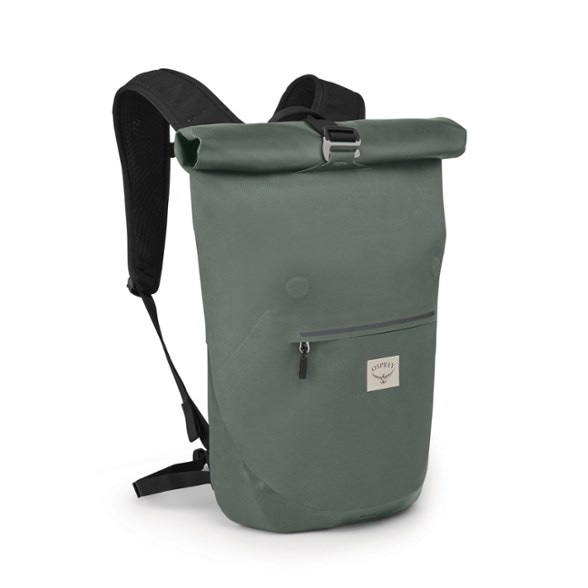 Side view of waterproof roll-top backpack with reflective graphics