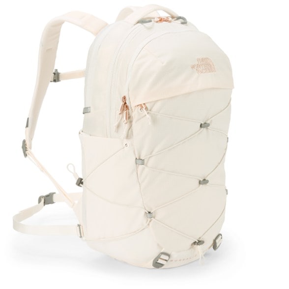 North Face Borealis Luxe backpack worn by a woman, showcasing its sleek design and laptop compartment